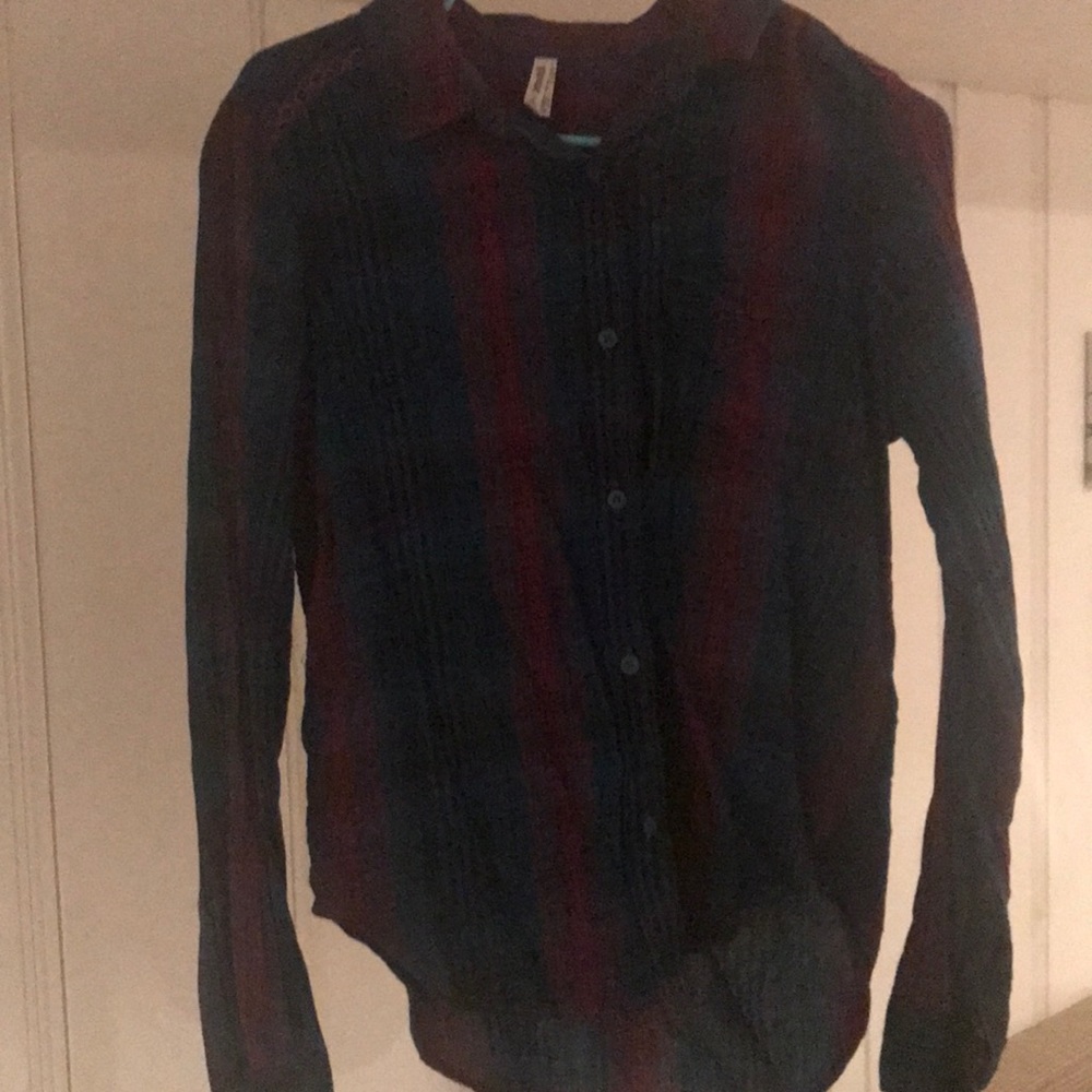 Purple, blue and pink plaid shirt.